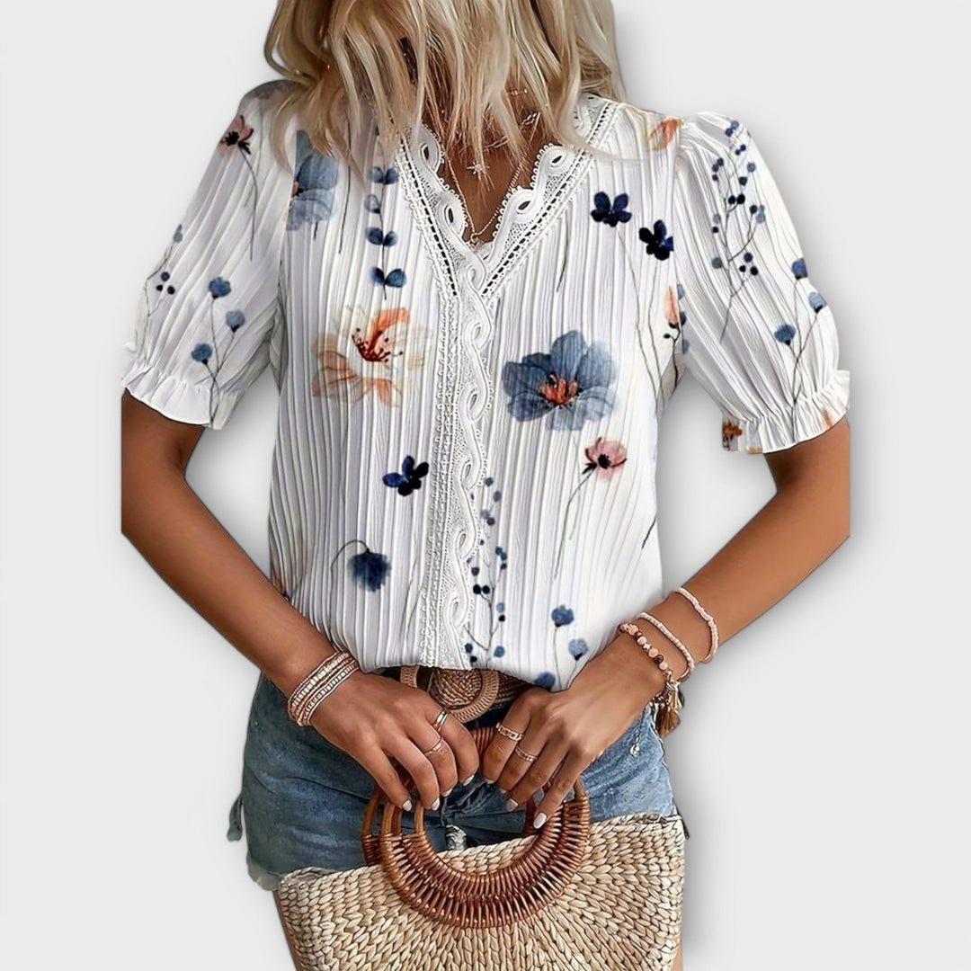 Módní blůza s špičatým výstřihem