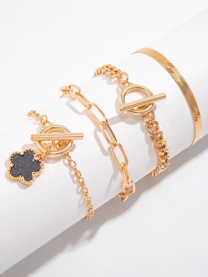 Náhrdelník z hadí kosti s náramky s trojlístkem